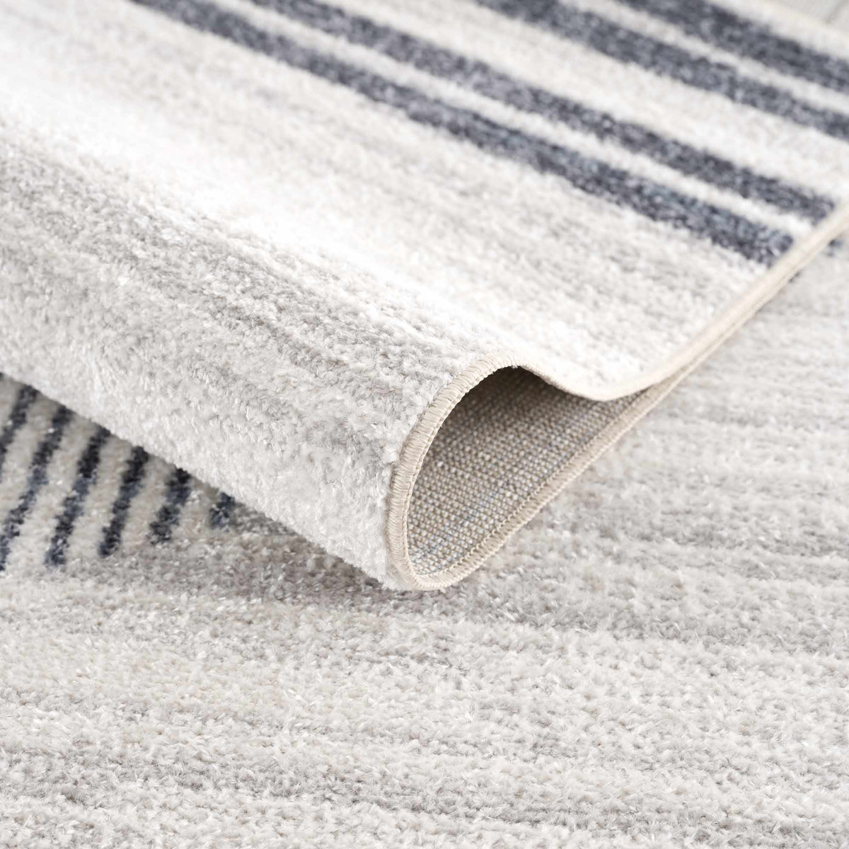 Thad Medium Gray Washable Area Rug - Curious Cart